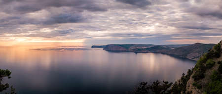Clouds are reflected in the waters of the bayの写真素材