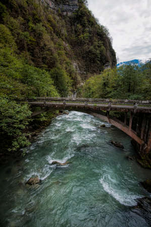 Bridge over the Bzyb mountain river in the Republic of Abkhaziaの写真素材