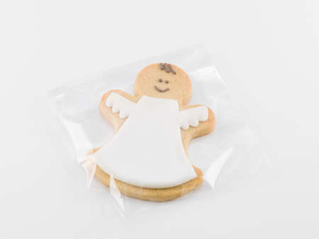 Angel baked biscuit on an envelopの写真素材