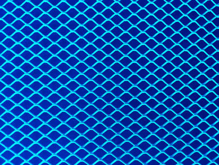 Light blue metal mesh on a blue background