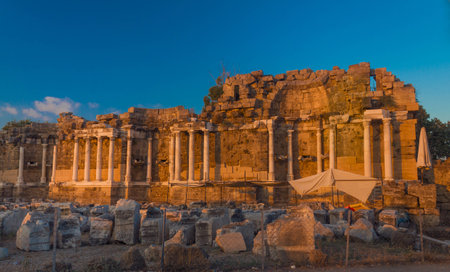 Ancient ruins in Side (Turkey) at sunsetの写真素材