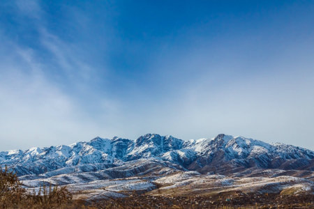 Picturesque mountain alps partially covered by snow, late fallの写真素材