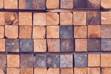 Closeup of stack of raw wooden planks