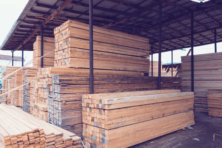 Closeup of stack of raw wooden planks