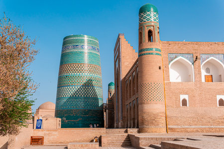 APRIL, 13, 2022 - Uzbekistan, Khiva: Ancient Uzbek town Khiva with Itchan Kala minaretのeditorial素材