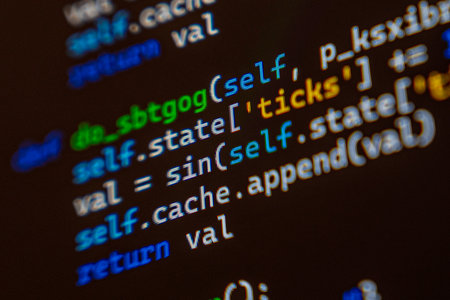 A detailed view of programming code displayed on a computer screen, showcasing syntax highlighting...