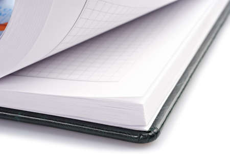 Open black leather book, browsing of pagesの写真素材