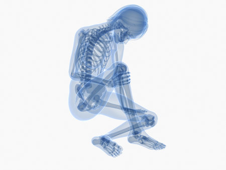 sitting female skeleton with painful kneeの写真素材