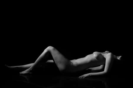 Contour-light picture of girl on black background の写真素材