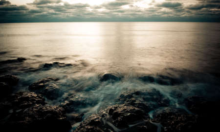 beautiful sunset on the beach の写真素材