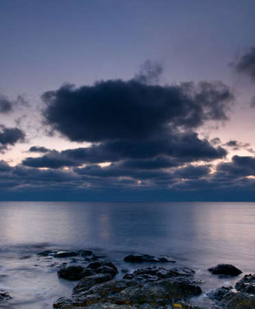 beautiful sunset on the beach の写真素材
