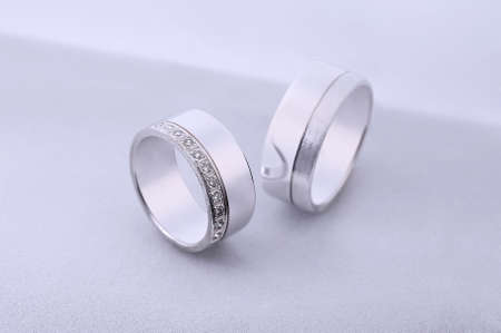 Diamond wedding rings on white backgroundの写真素材
