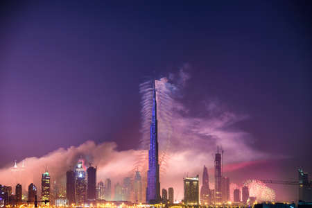 2016 January 1, UAE, Dubai: Burj Khalifa New Year fireworks. Fire at The Address Hotel on January 1...