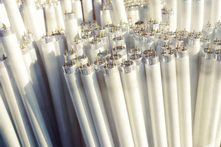 Fluorescent light tubes, electric pieces of rubbish, backgroundの写真素材