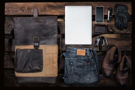 Men's accessories set, lay flat, on wooden paletteの写真素材