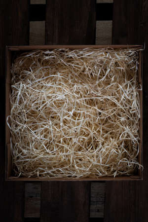 Hay in box  on brown wooden pallet