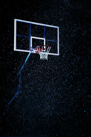 Basketball houp on black arena background, sport conceptの写真素材