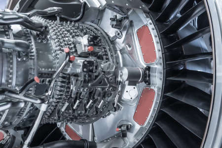 Turbine Engine. Aviation Technologies. Aircraft jet engine detail during maintenance. Blue toned.の写真素材