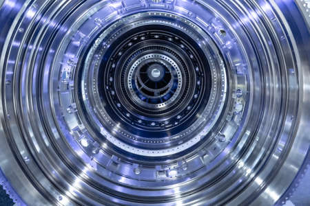 Turbine Engine. Aviation Technologies. Aircraft jet engine detail during maintenance. Blue toned.