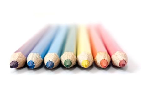 Seven pencils as a rainbow with a shade on a white backgroundの写真素材