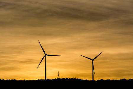 Windmill for our future. Natural energy for our future.の写真素材