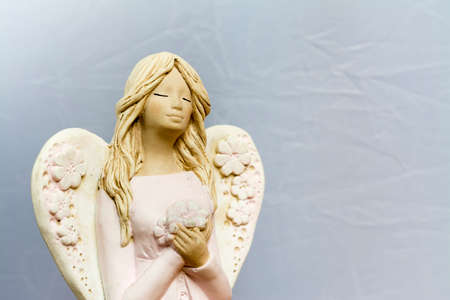 Angels are praying for us, for our soul and our future.の写真素材