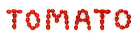 Word TOMATO written with cherry tomatoes. Look at my gallery for more fresh fruits and vegetables.の写真素材