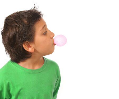 Bubble gum boy portrait with fun expressions. Look at my galery for more pictures of this modelの写真素材