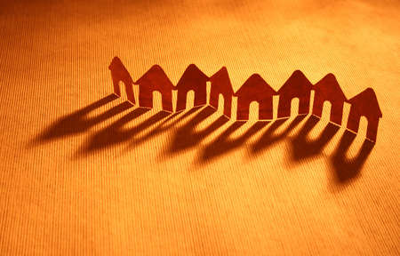 Paper chain neighborhood, several houses on a rowの写真素材