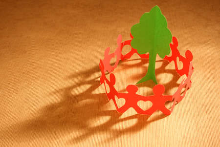 Paper chain people united to save the environmentの写真素材