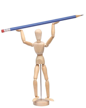 wood mannequin holding a pencil over whiteの写真素材