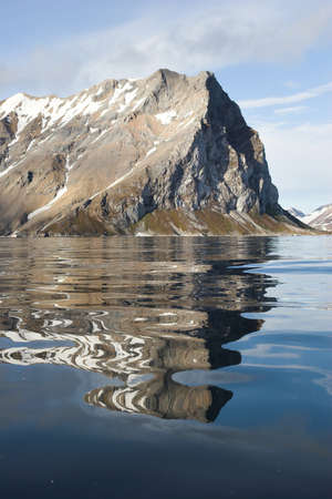 Mountain reflection in the waterの写真素材