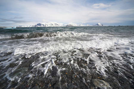 Waves breaking on the shore - Spitsbergen, Svalbardの写真素材