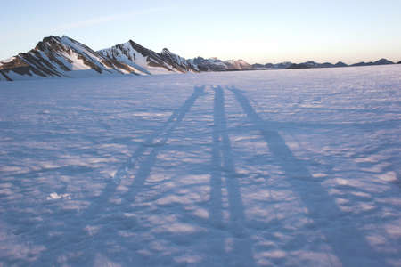 People on the glacier - long shadowsの写真素材