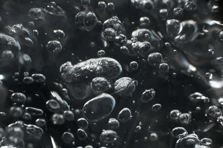Air bubbles frozen in the glacier iceの写真素材