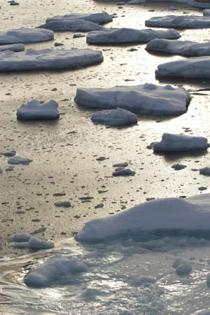 Arctic winter landscape - ice on the frozen fjord