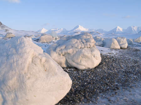Arctic winter landscape - ice forms on the beach
