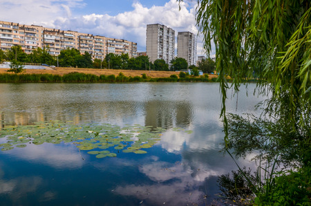 Lake, city, sky and summerの写真素材