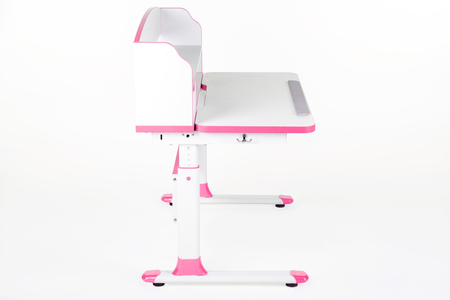 pink school desk is isolated on a white backgroundの写真素材