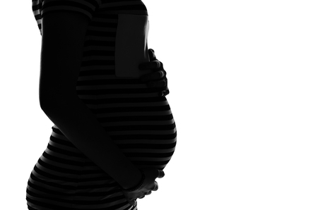 Silhouette profile of a pregnant woman on a white backgroundの写真素材