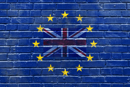 a brick wall with a flag of the Great Britain inside the flag of the European Unionの写真素材