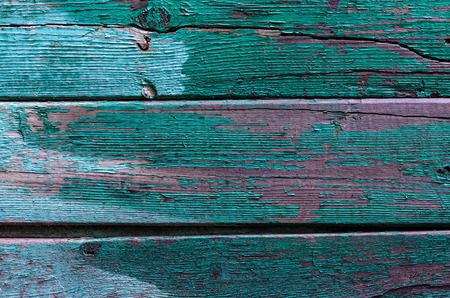 texture peeling green paint on a wooden board on the whole frameの写真素材