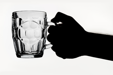 beer glass in handの写真素材