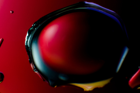 Abstract background of colorful drops and drops of water or oil on the whole frameの写真素材