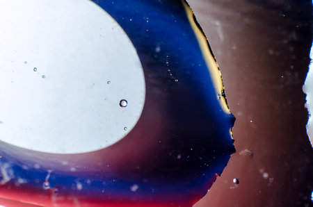 Abstract background of colorful drops and drops of water or oil on the whole frameの写真素材