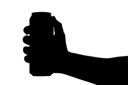 a can with a drink in handの写真素材