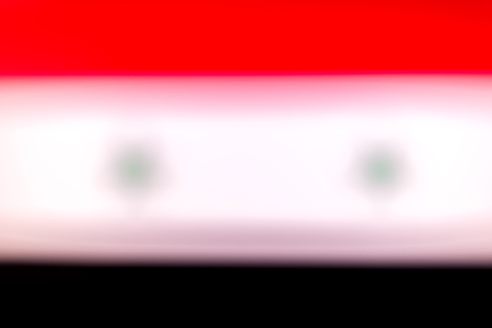 the flag of Syria in defocusの写真素材