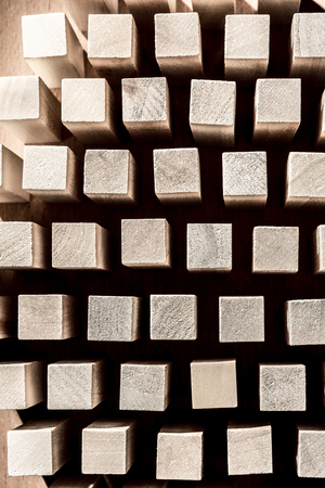 Risk and strategy in business, many identical wooden blocks. Vertical frameの写真素材