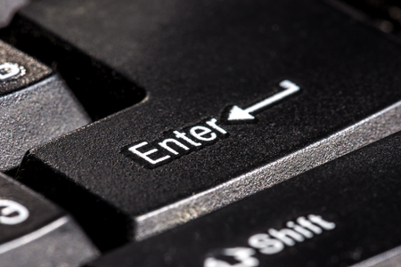 black enter keypad close up. Horizontal frame