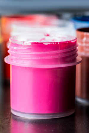 Bank of pink gouache on the whole frame. Vertical frameの写真素材